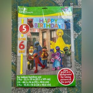 Sesame Street party items- photo backdrop, air walker baloons, etc